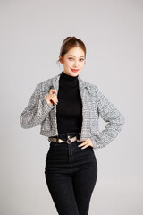 Portrait of Asian smart happy entrepreneur business woman smile in casual suit gesture cross arms...