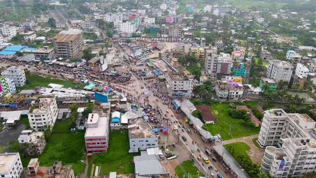 A Bustling Highway Near the Rupatoli Bus Station in Barisal, Bangladesh - Aerial Drone Shot