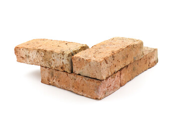 Solid clay bricks used for construction,Old red brick isolated on white background.