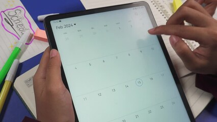 check activity schedule or date on the tablet screen