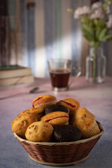 muffins with coffee and some flowers