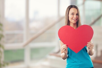 Woman show red heart shape