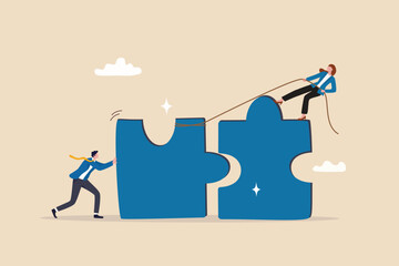 Jigsaw puzzle connection, teamwork partnership to help solve problem or challenge, cooperation or brainstorm to fit and match jigsaw pieces concept, businessman and woman help connect jigsaw puzzle.