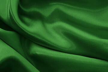 Dark green fabric cloth texture for background and design art work, beautiful crumpled pattern of...