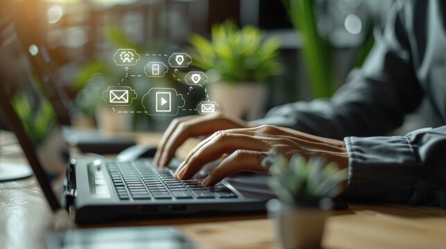 Modern Professional Working on Laptop with Digital Marketing Icons Overlay