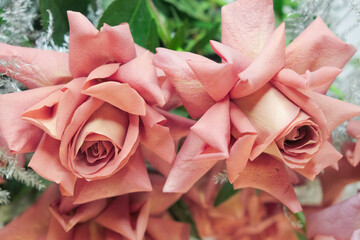 The fabric imitation roses for decoration.