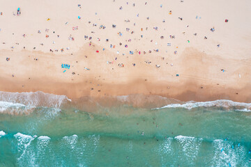 Aerial view of people sunbathing at Bondi beach, Sydney, Australia