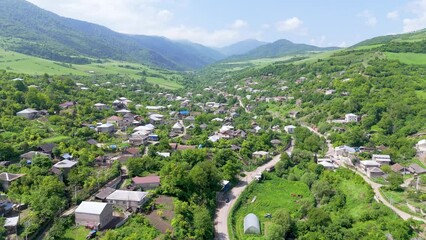 An aerial view of beautiful mountains view of the village