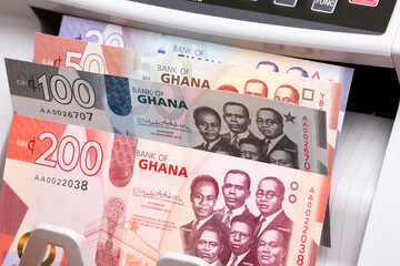 Ghanaian cedi in a counting machine