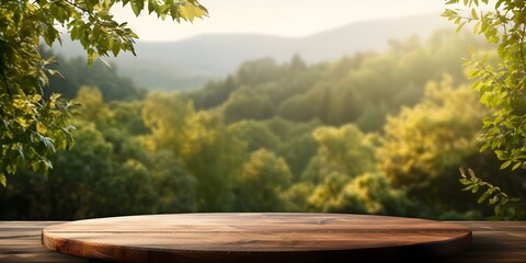 Obraz premium Blurry forest background behind empty wooden round table ideal for product placement. Concept Forest Table Setting, Product Placement, Woodland Theme