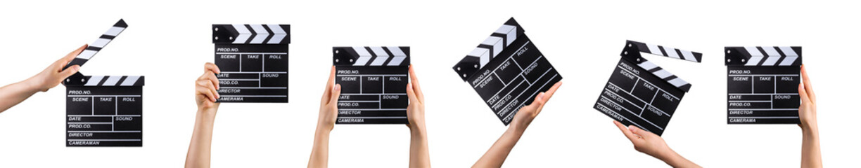 Human hand holding film clapper board isolated on white background