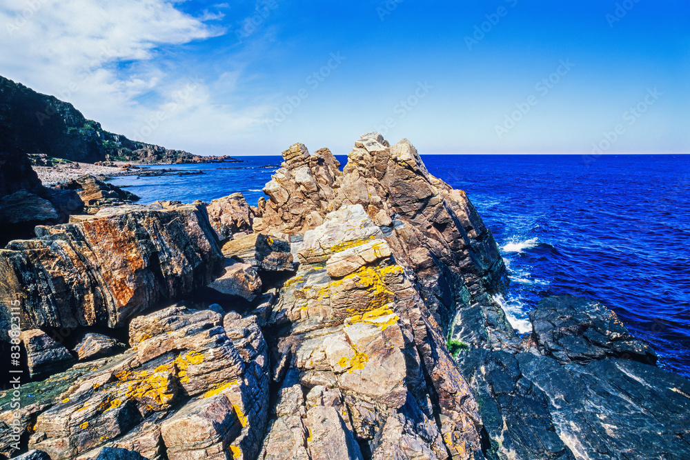 Poster Rocky coastline with rocks by the sea