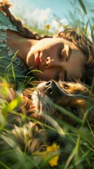 Obraz premium A woman laying in the grass with her dog