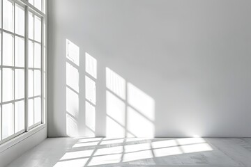 Fototapeta premium Bright sunlight casting shadows on empty white room.