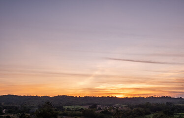  Panoramic view of sunset golden and blue sky nature background.
Colorful dramatic sky with cloud at sunset.Sky background.Sky with clouds at sunset.