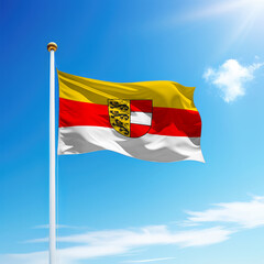 Waving flag of Carinthia is a state of Austria on flagpole