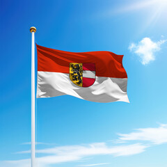 Waving flag of Salzburg is a state of Austria on flagpole