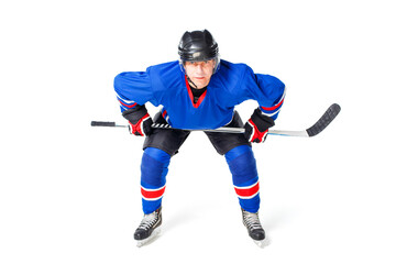 Middle aged man in blue hockey uniform isolated on white background