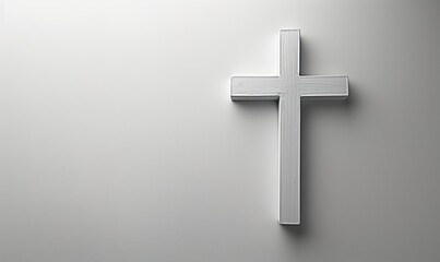 Naklejka premium A modern minimalist religious cross showcased against a plain white background, epitomizing simplicity and elegance