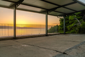Covered car parking stands overlooking the Adriatic Sea