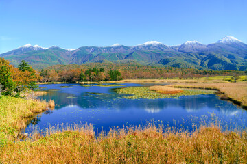 Shiretoko Goko Lakes (Shiretoko Five Lakes) and Shiretoko Mountains with autumn leaves, Shiretoko, Hokkaido, Japan.