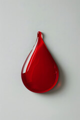 Obraz premium Red blood drop isolated on a white background. World Blood Donor Day