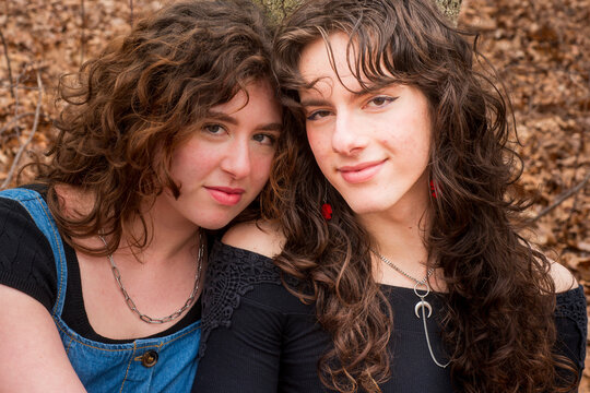 Portrait of teen siblings in the woods