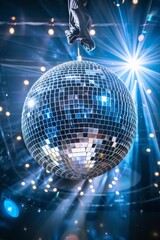 Fototapeta premium Closeup of a disco ball, stage background, photography.