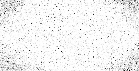 Black grunge speckle on white background. Distress grain abstract texture with grungy splash dirty pattern. Backdrop with specks, grit, scratches, rough sand effect  