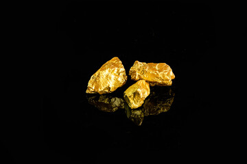 Closeup of big gold nugget finance concept