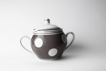 Vintage ceramic sugar bowl in minimalist retro style.