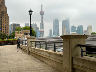Fototapeta premium Shanghai skyline with historical Waibaidu bridge, center of Shanghai city, China