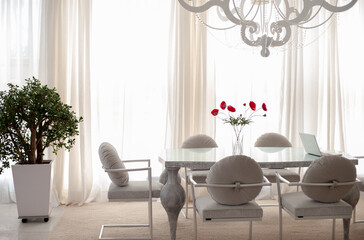 interior of a bright room with a table