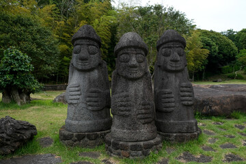 Obraz premium Spirited garden in Jeju island, South Korea. Dol Harubang as a symbol of Island