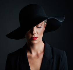 Mature woman, elegance and hat for fashion with classy clothes, unique luxury and designer brand in...