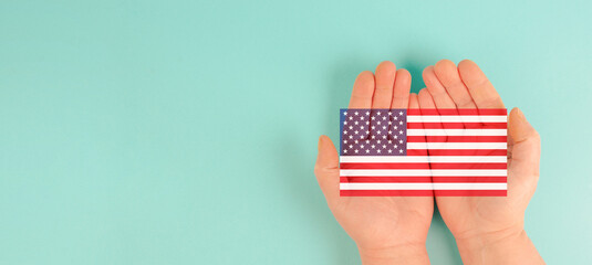 US election, hands holding american flag, citizens of America voting president