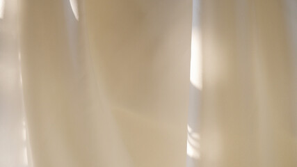 White fabric background in shadow. Close-up soft white fabric texture for luxury, abstract,...