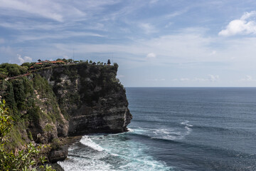Scenic ocean view with cliffs under a clear blue sky