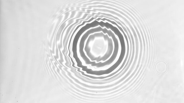 Water drop falling down in slow motion, Top view
