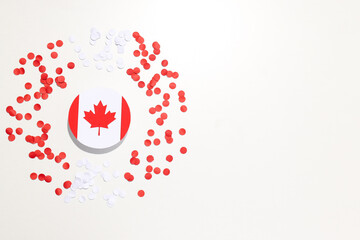 Maple leaf with decorations on a light background