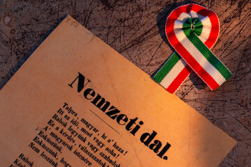 Hungarian tricolor cockade and national song