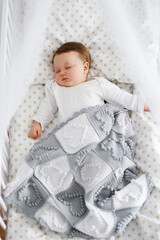 Baby sleeping in the crib