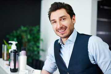 Portrait of confident hairdresser