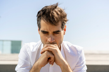 Portrait of serious businessman outdoors