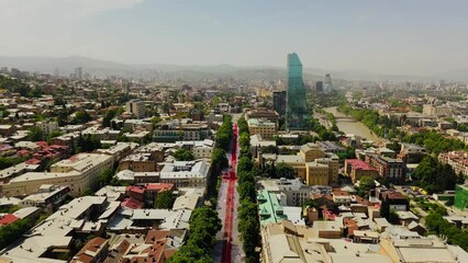26 May 2024 Independence Day in Georgia, Tbilisi, on Rustaveli Aveniu and Ribbons in the colors of the flag in front of the Parliament