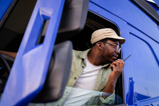 Truck driver carefully parking vehicle.