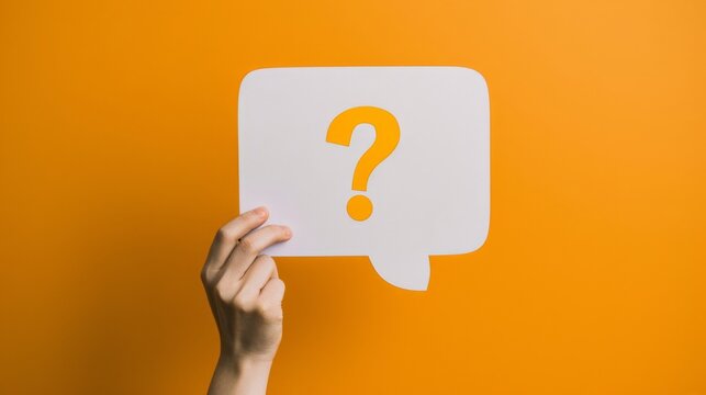 The hand holding question mark