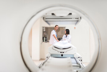 Two doctors at MRI scanner