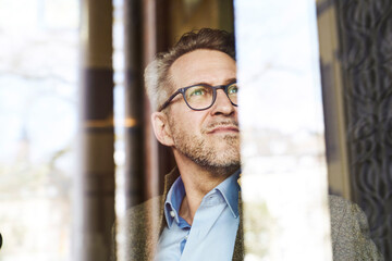 Portrait of businessman looking at distance