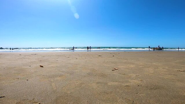 Tourists on beach in Panjim